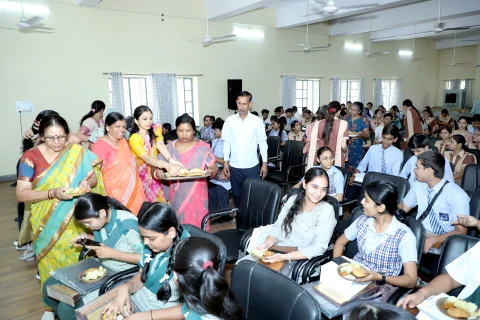 Students and teachers during refreshments after the award ceremony